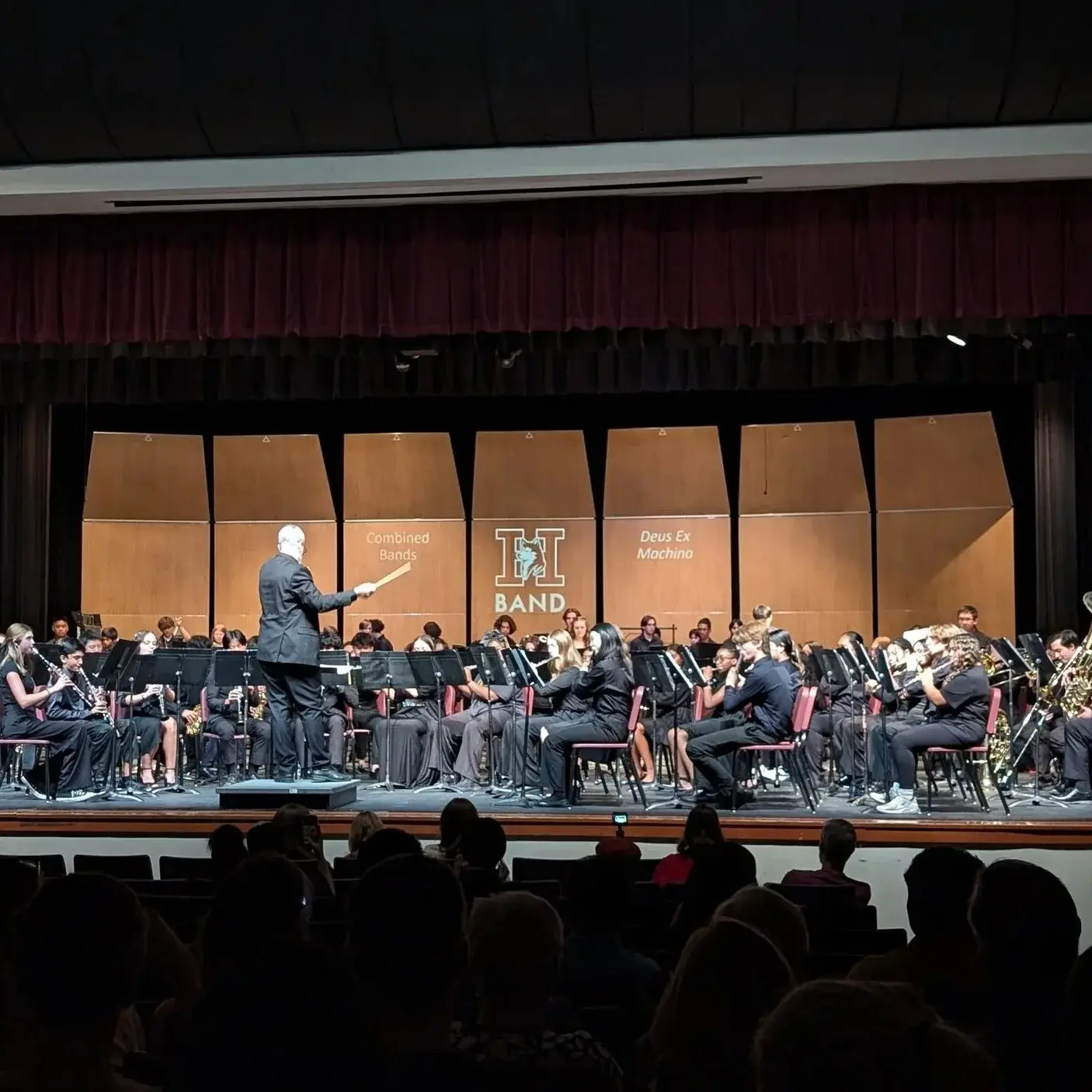 Mr. Werner conducting the combined Hamilton bands on stage